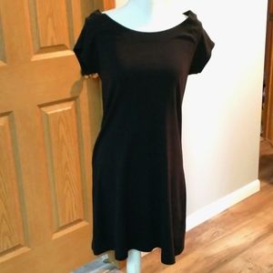 A black casual T-shirt dress.